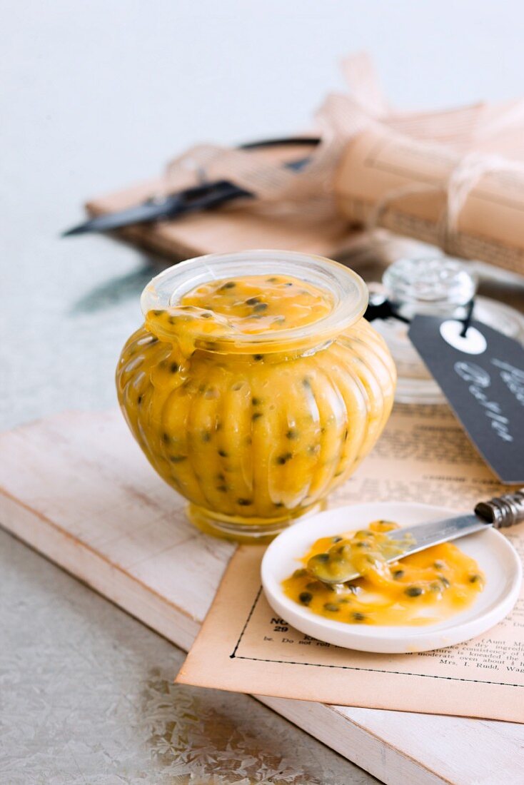 Passion fruit butter in a jar and on a plate