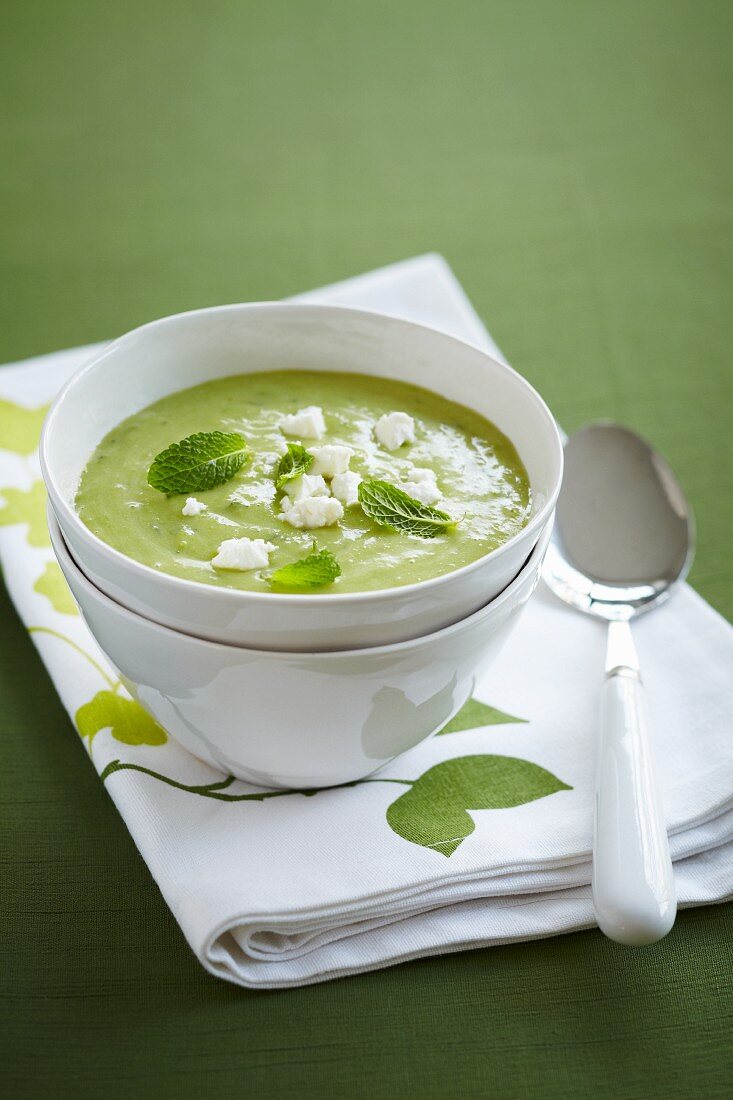 Mint soup topped with crumbled sheep's cheese