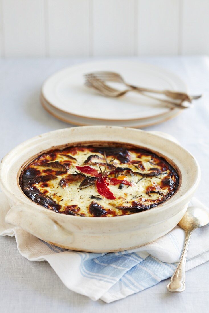 Mousaka with cheese and chilli peppers