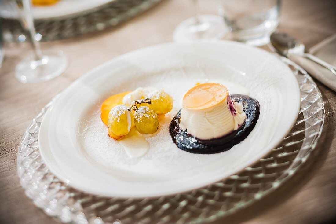 Festive panna cotta in a berry sauce