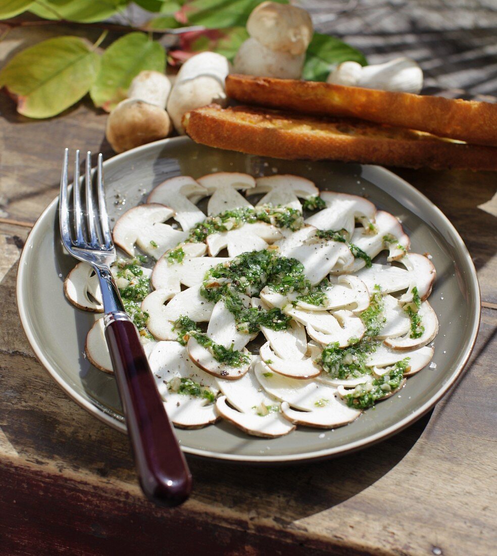 Autumnal porcini mushroom carpaccio with hazelnut pesto