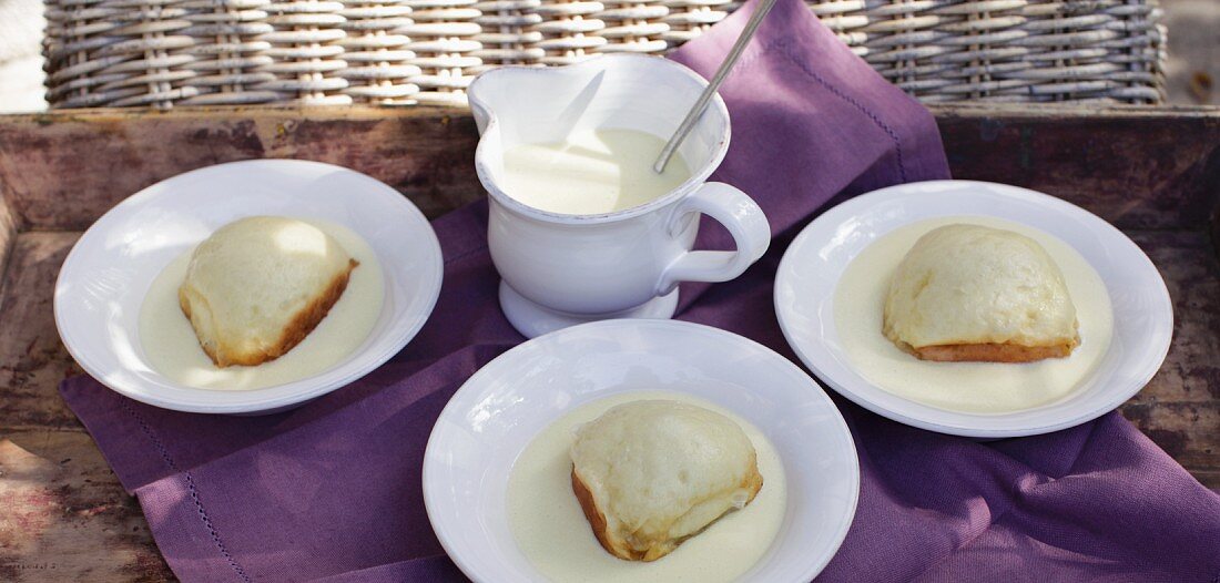 Palatinate Dampfnudeln (steamed, sweet yeast dumpling) with vanilla sauce