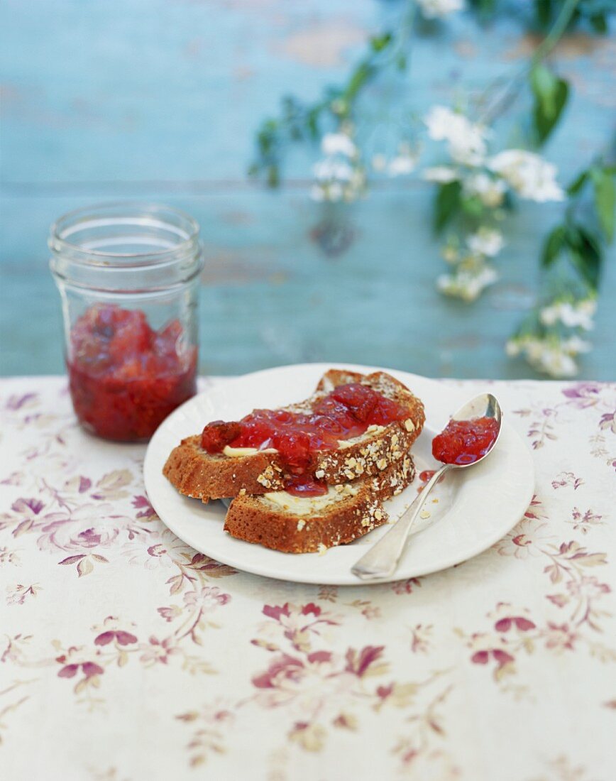 Bread and jam on a garden table