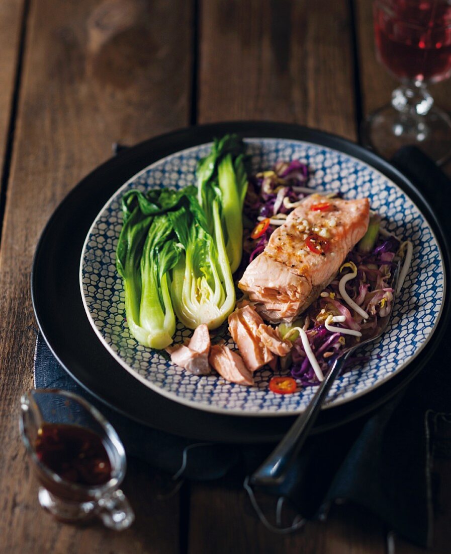 Steamed salmon fillets on a cabbage medley