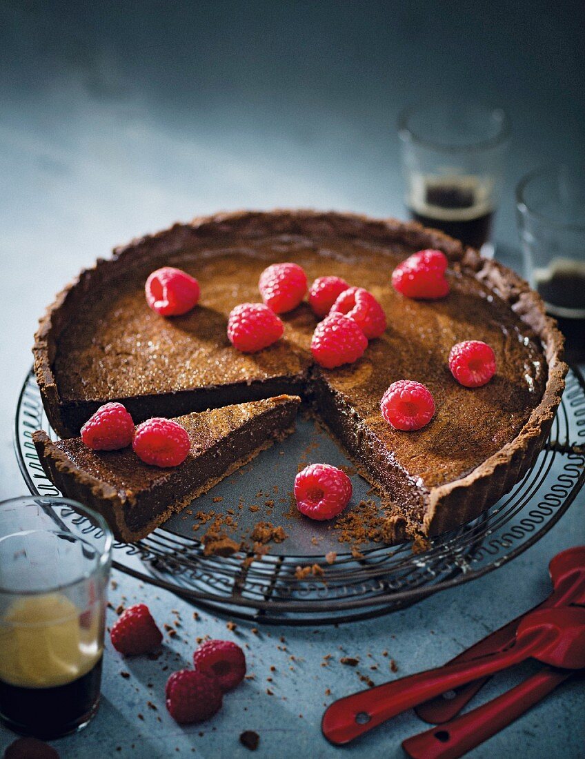 Chocolate torte topped with raspberries