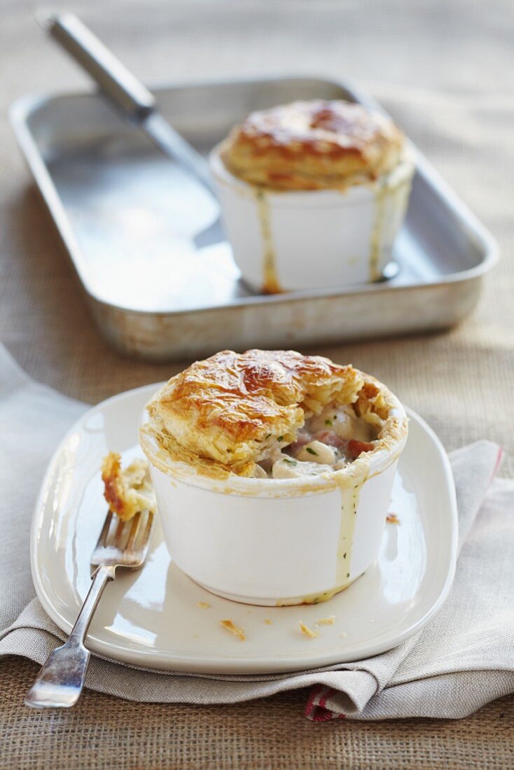 Chicken and bacon pies with a puff pastry topping