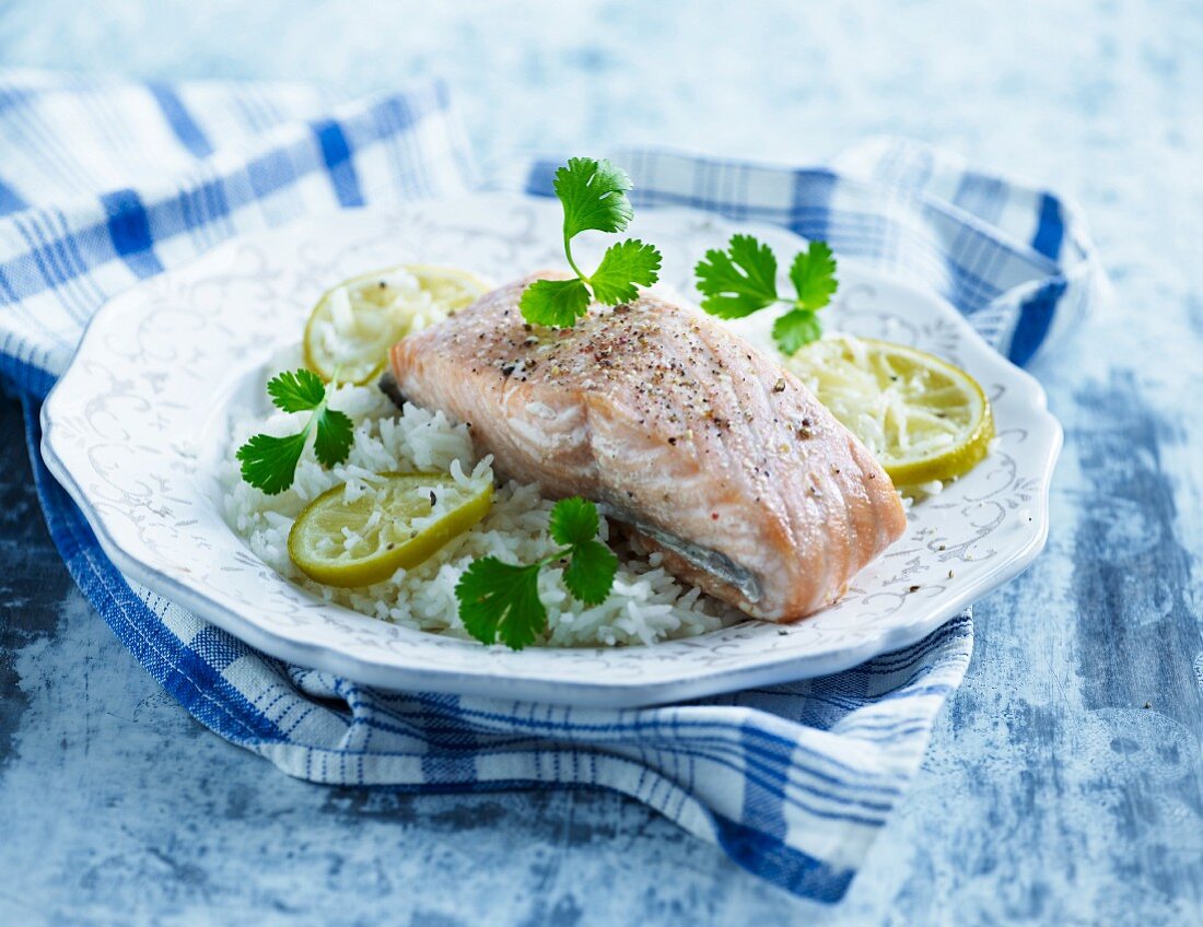 Steamed salmon on lemon rice with coriander