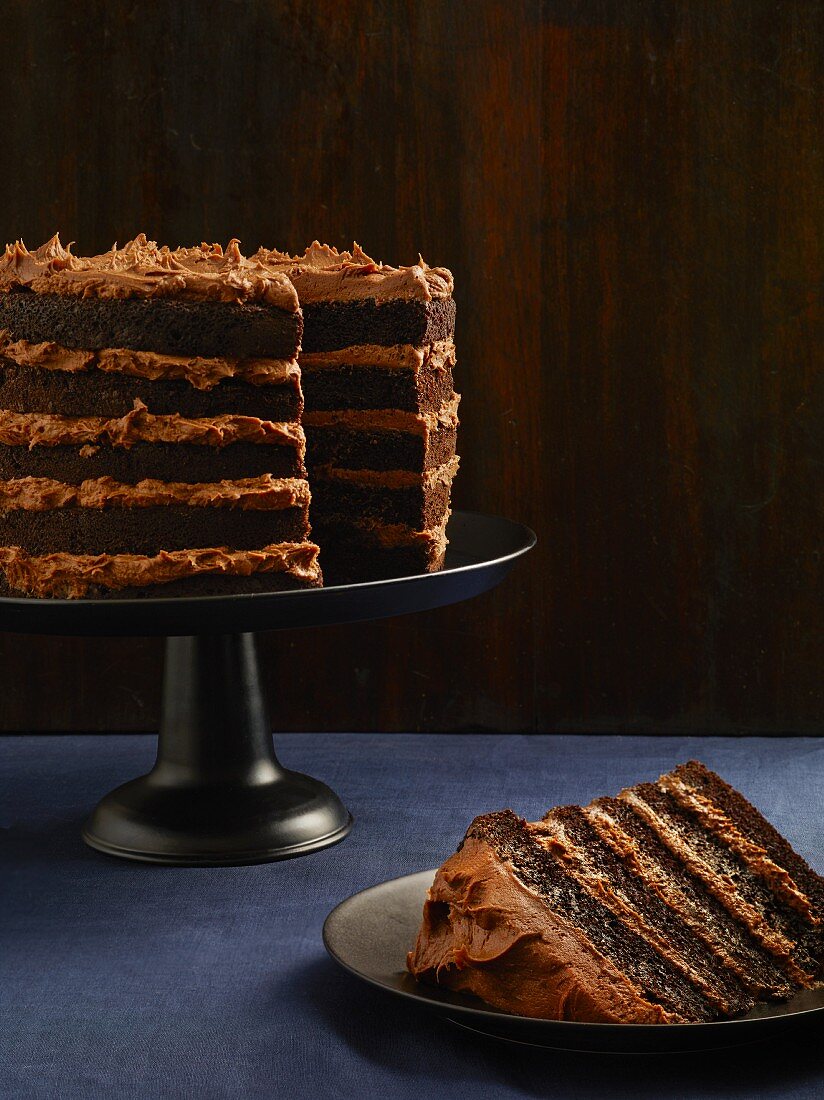 A layered chocolate cake, sliced