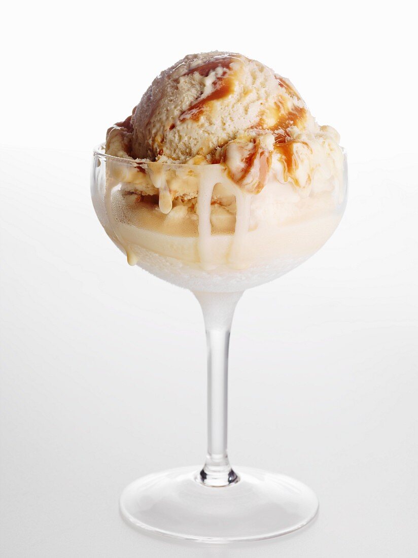 Caramel ice cream in tall glass