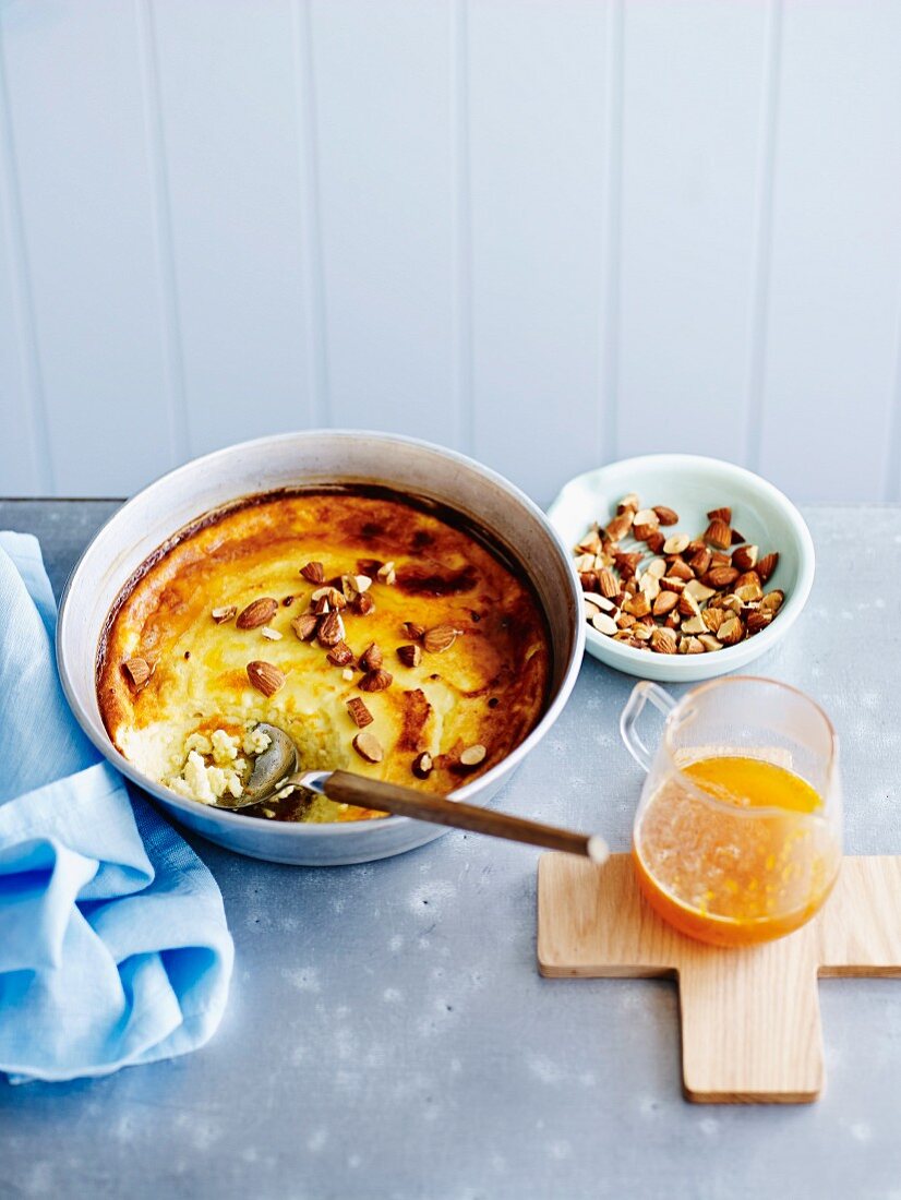 Baked ricotta with honey, orange and almonds