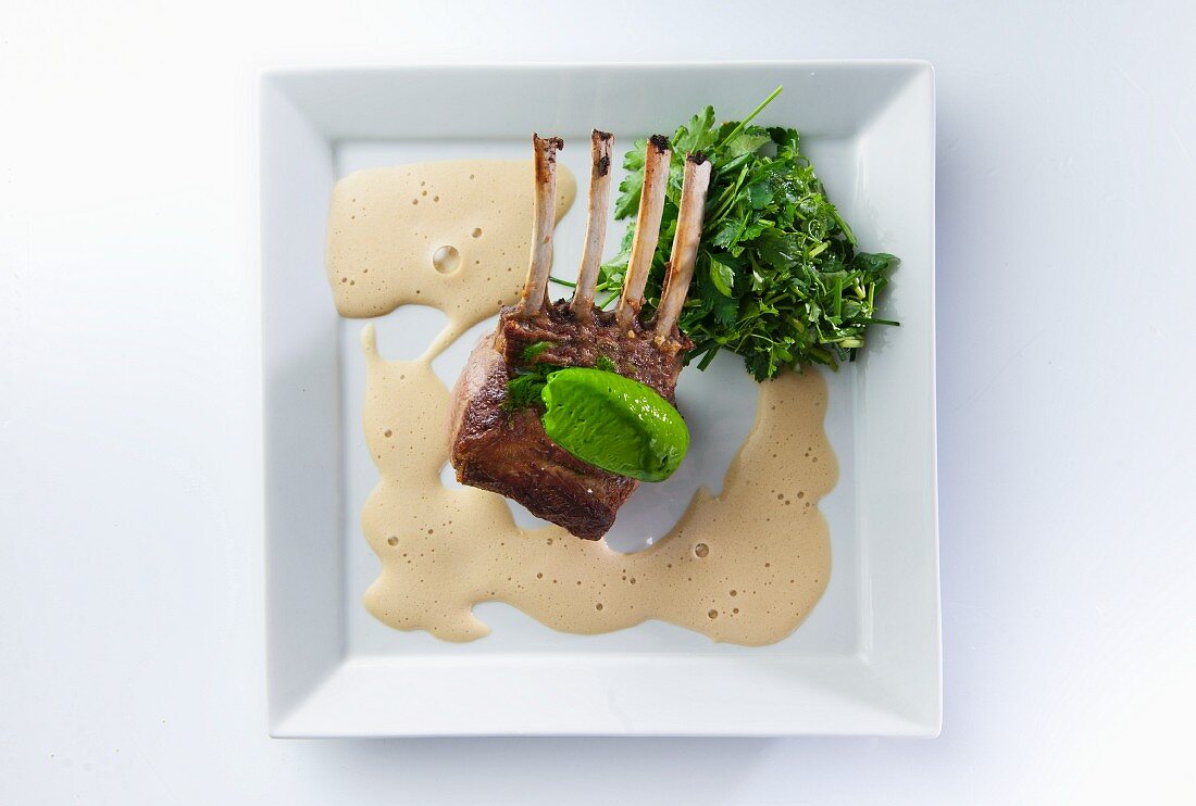 Rack of lamb with a Guinnes foam sauce and mushy peas