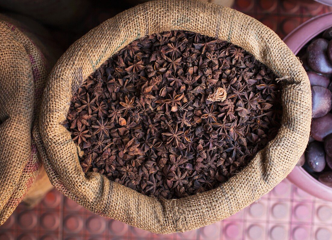 Star anise in a jute sack at an Indian street market