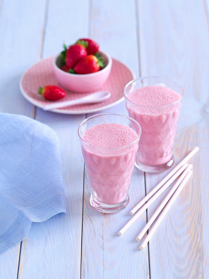 Strawberry smoothies and fresh strawberries