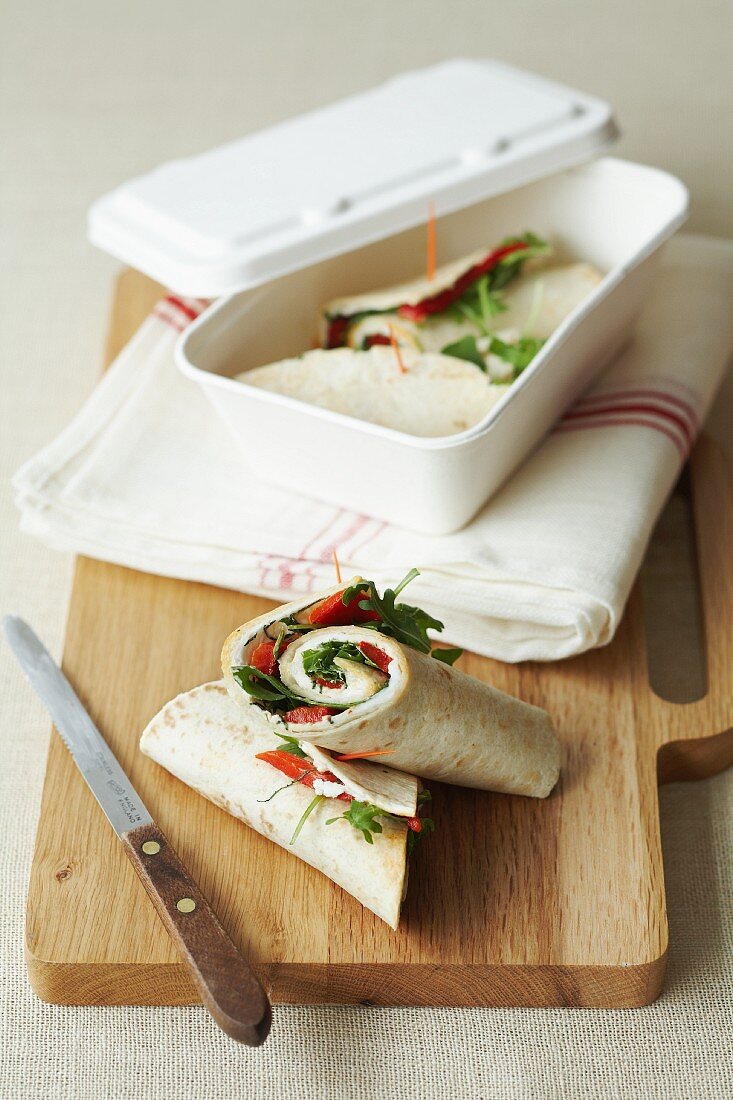 Wraps filled with pepper, rocket and cheese