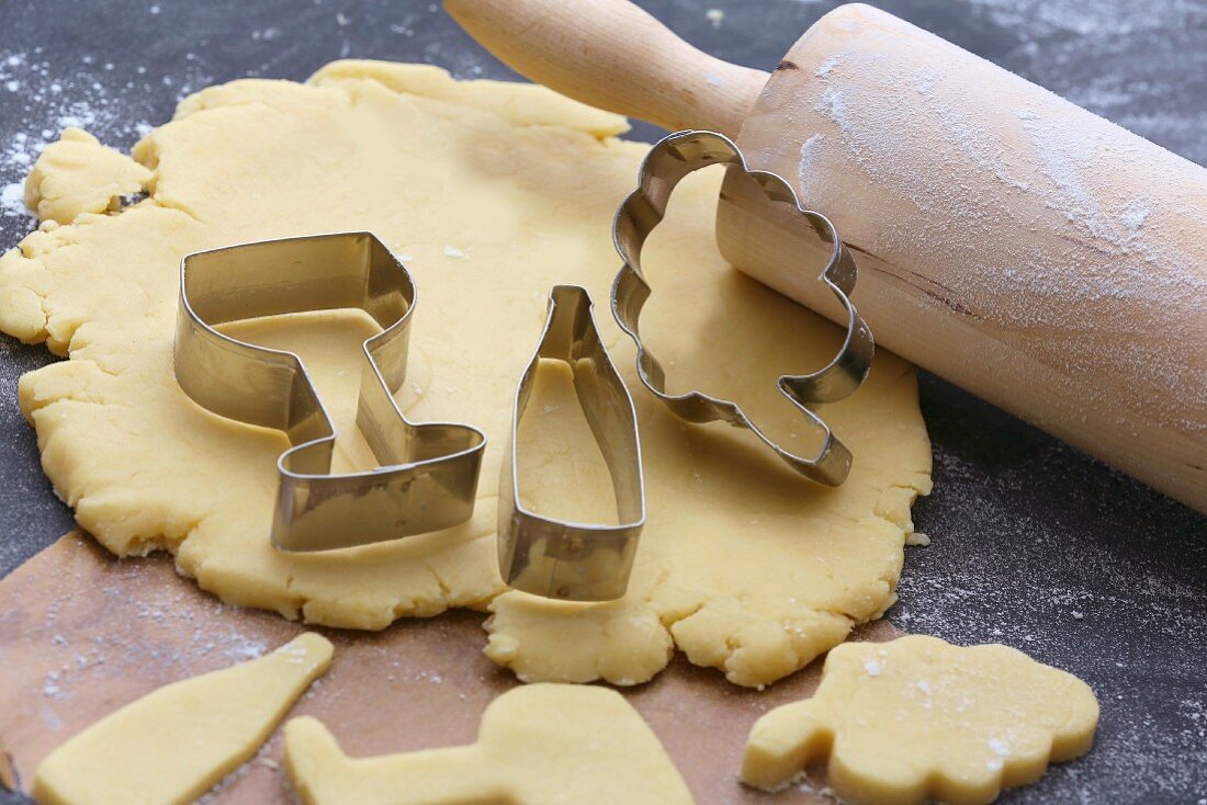 Biscuit pastry, a rolling pin and cutters