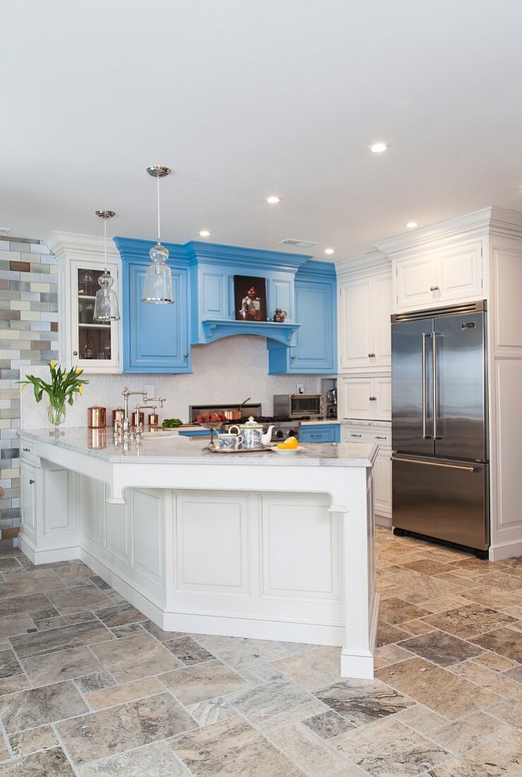 Kitchen with blue and white cabinets