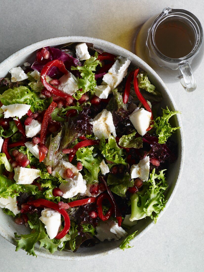 Mixed leaf salad with goat's cheese and pomegranate molasses