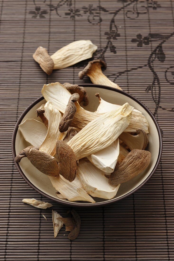 A bowl of dried king trumpet mushrooms