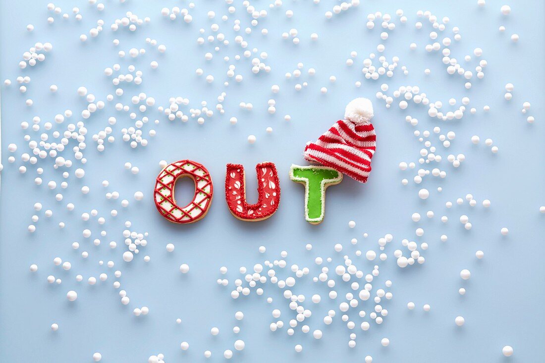 Letter shaped biscuits spelling the word OUT