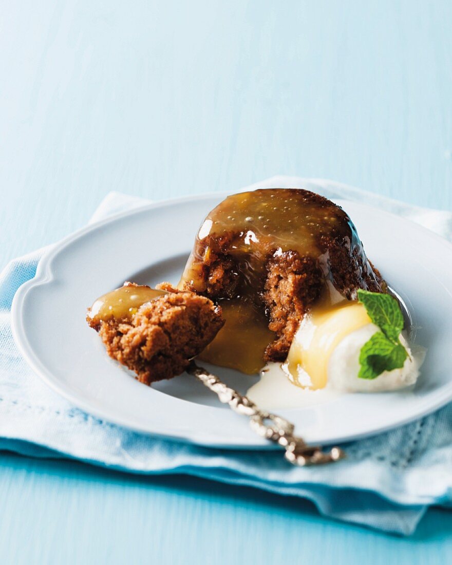 Gingerbread pudding with ginger ale and brandy sauce