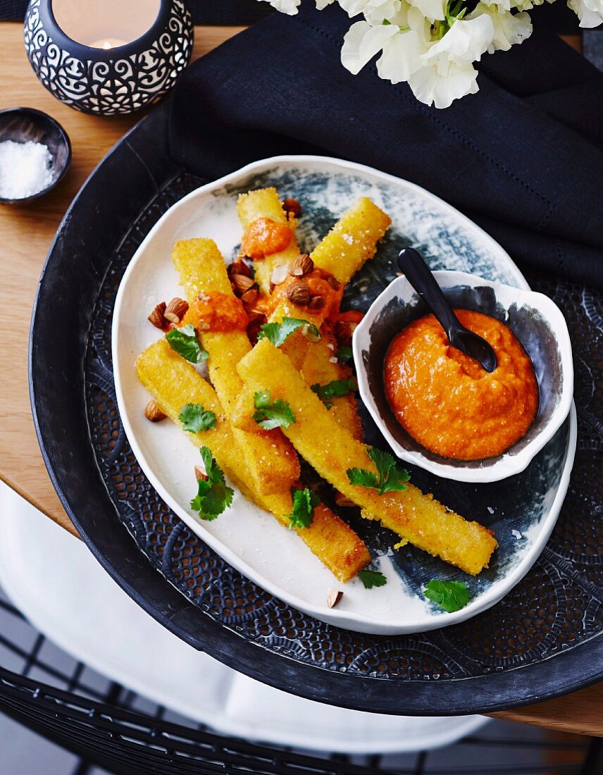 Polenta fritters with Romesco sauce