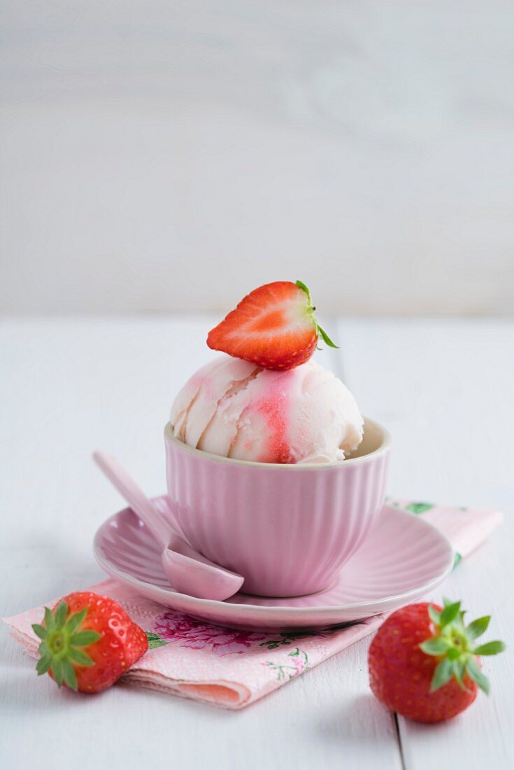 Strawberry ice cream in a pink cup