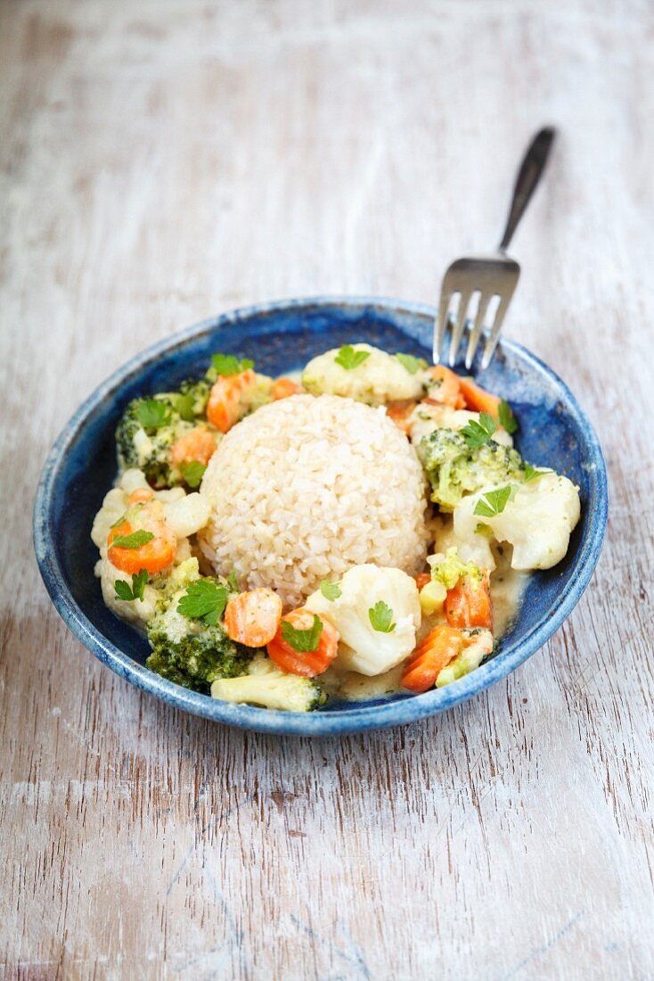 Vegan vegetable dish with wholegrain basmati rice