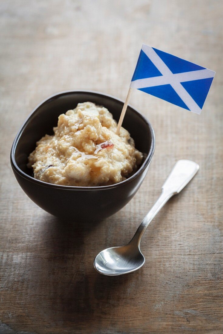 Porridge in bowl with a Scottish flag