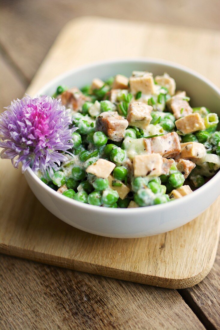 Pea salad with spicy tofu, soya yoghurt, chives and mint