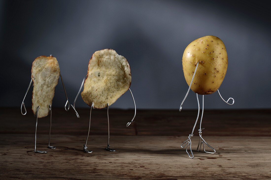 Potato crisp men watching a potato girl