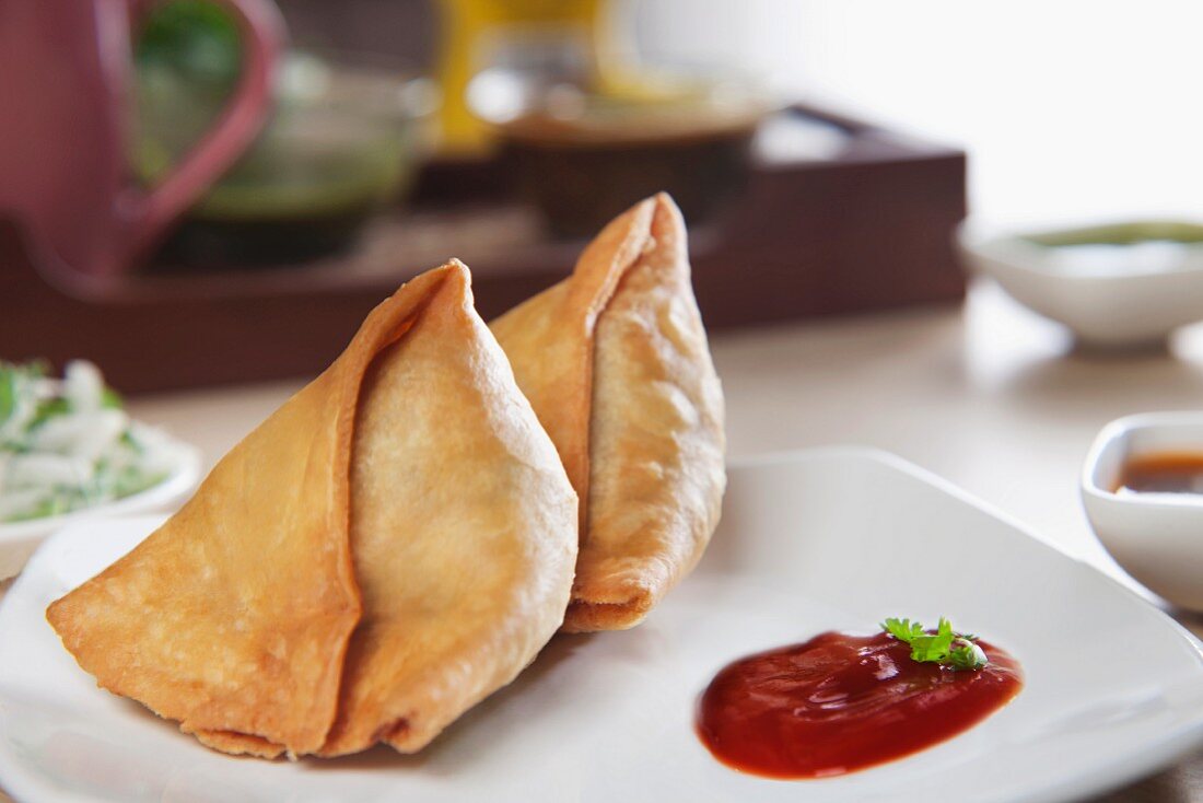 Samosas with tomato ketchup