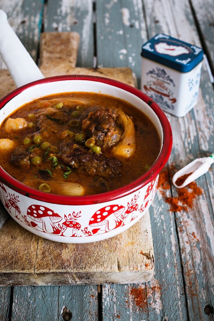 Spicy beef soup in a saucepan