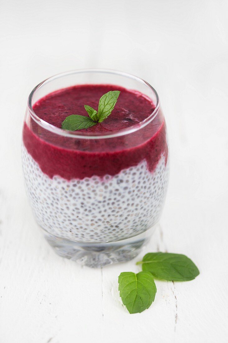 Chia seed pudding with fruit and fresh mint