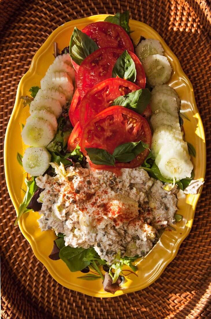Summer chicken salad with tomatoes and cucumber