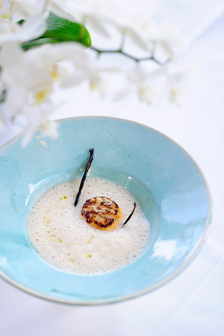 Foamy chestnut soup with scallops and vanilla