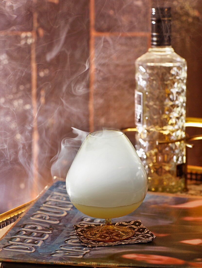 Smoke on the Water cocktail with Absinth and liqueur