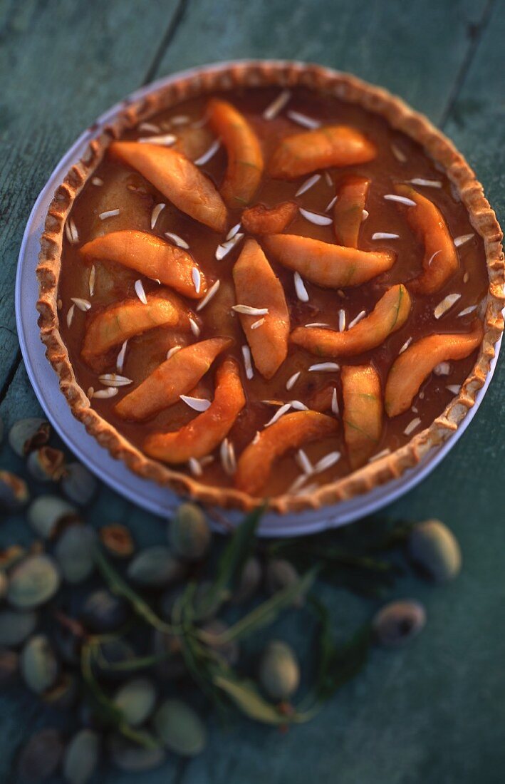 Melon tart with slivered almonds