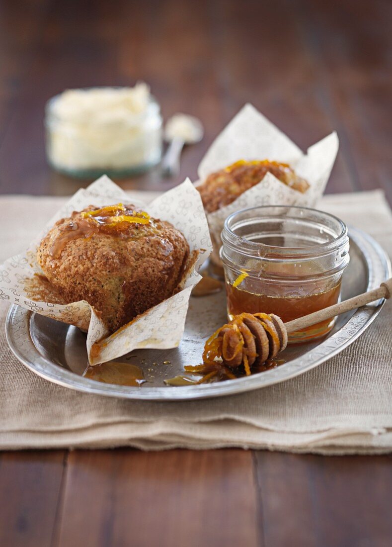 Orange and poppy seed muffins with honey
