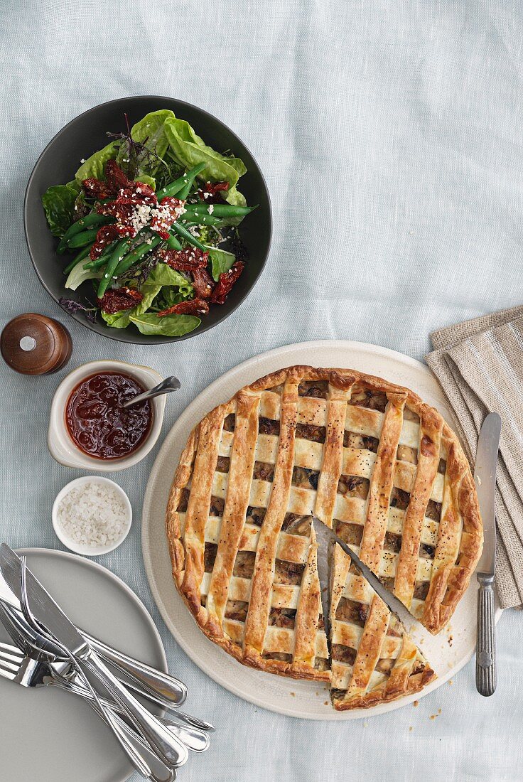 A lattice topped pie and a side salad