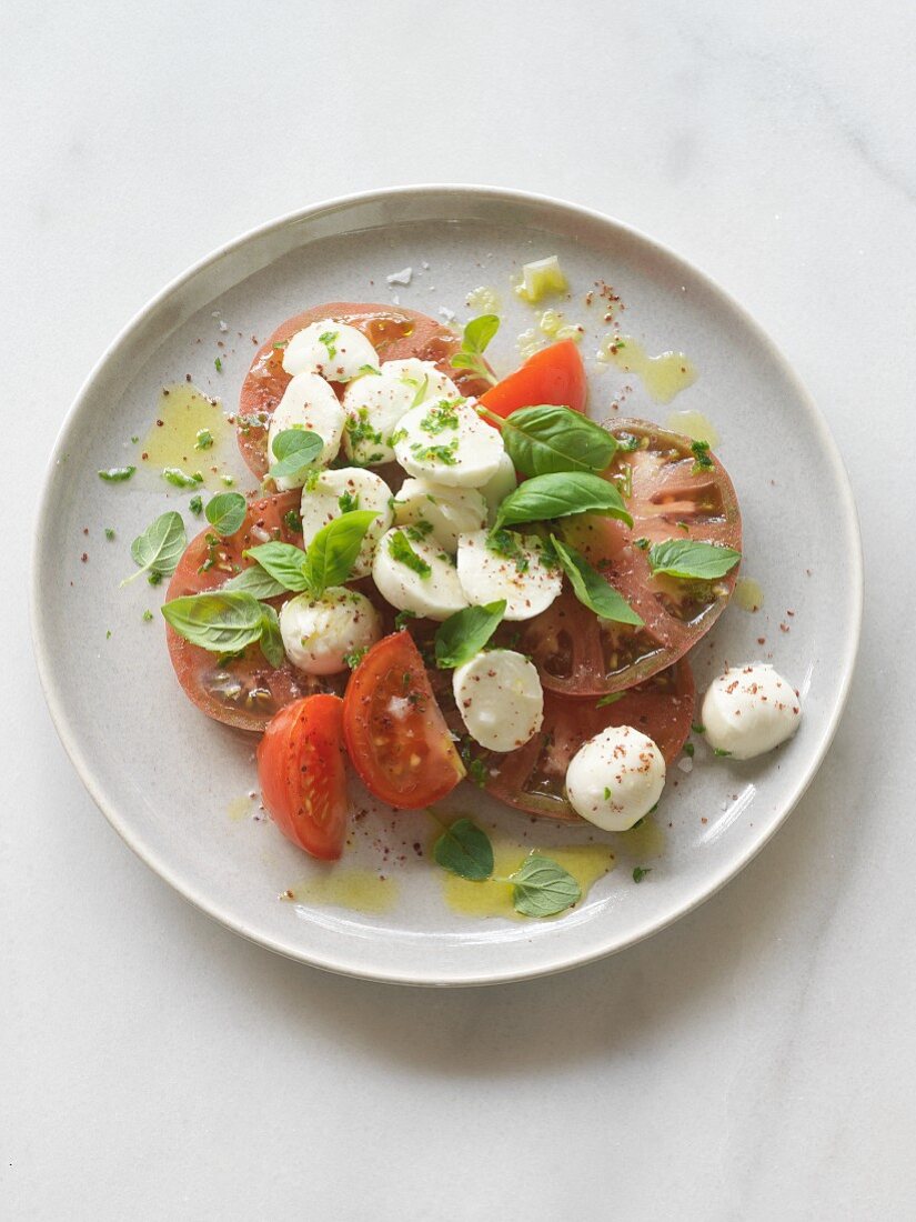 Tomatoes with mozzarella and basil