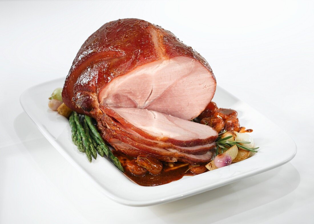 Sliced roast ham with vegetables