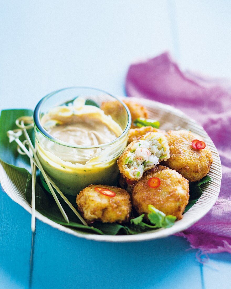 Prawn and coconut cakes with a peanut dip