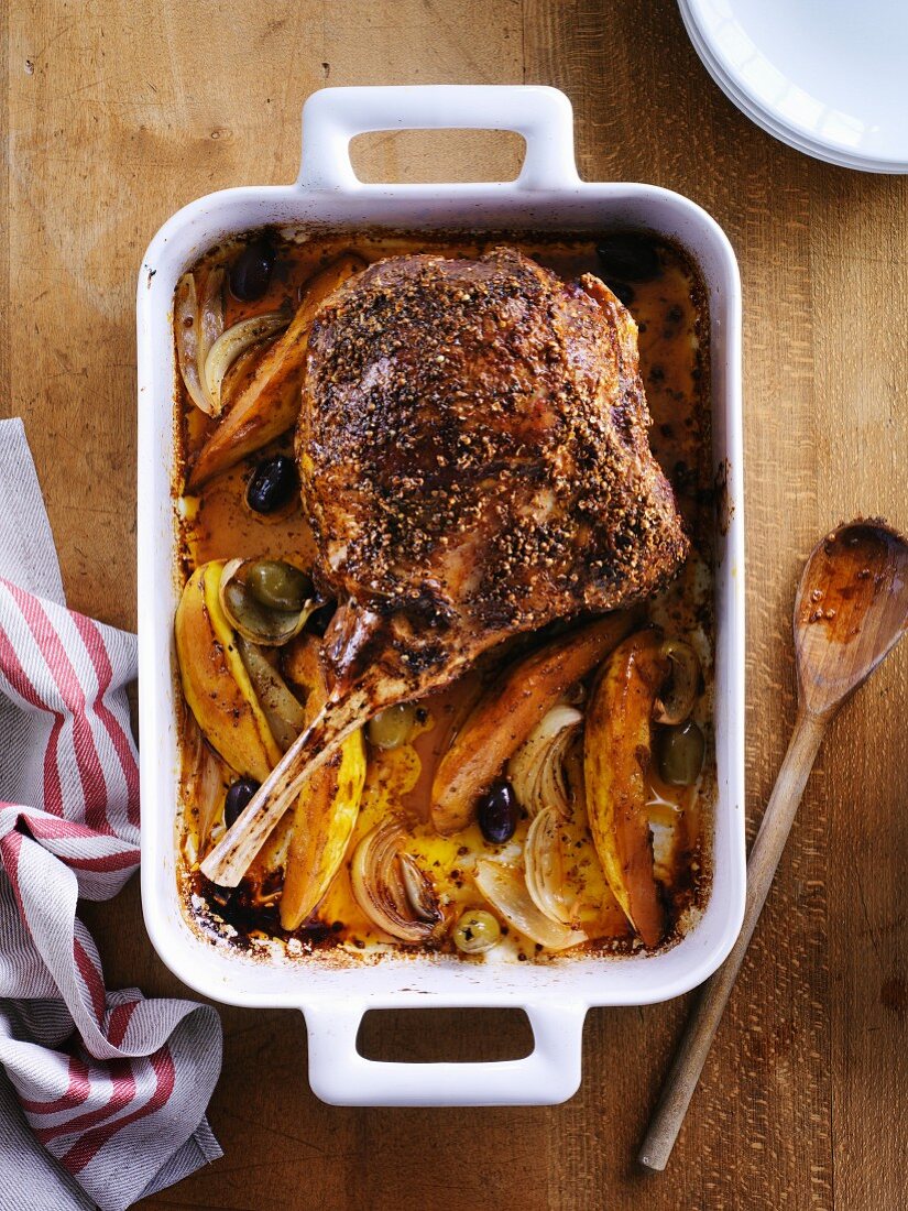 Roasted leg of lamb with pumpkin and olives