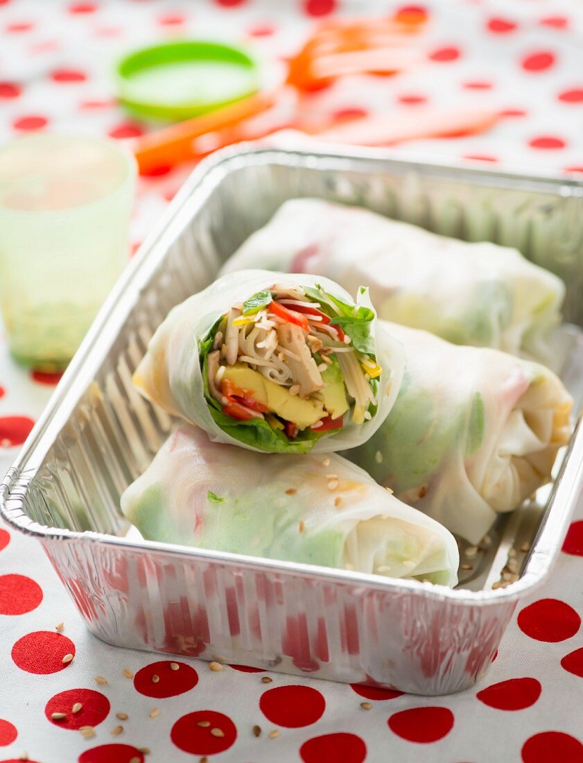 Summer rolls with avocado, chillis, lettuce, noodles and bean sprouts