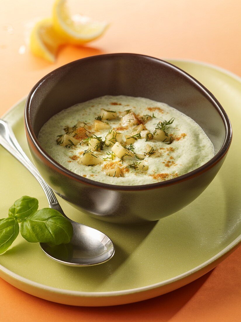 Cold cucumber soup with herb mozzarella