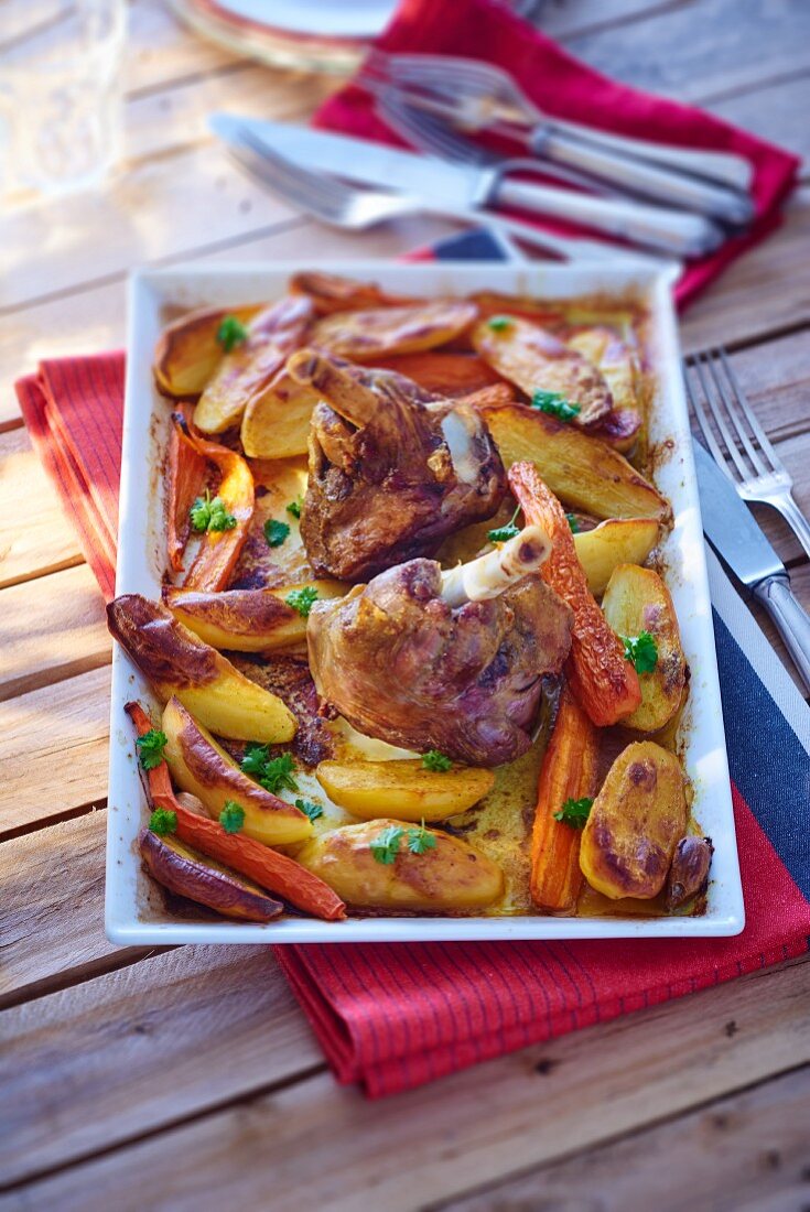 Leg of lamb with potatoes and carrots