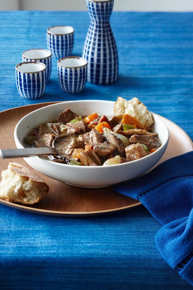 Beef stew with carrots, celery, onions and mushrooms