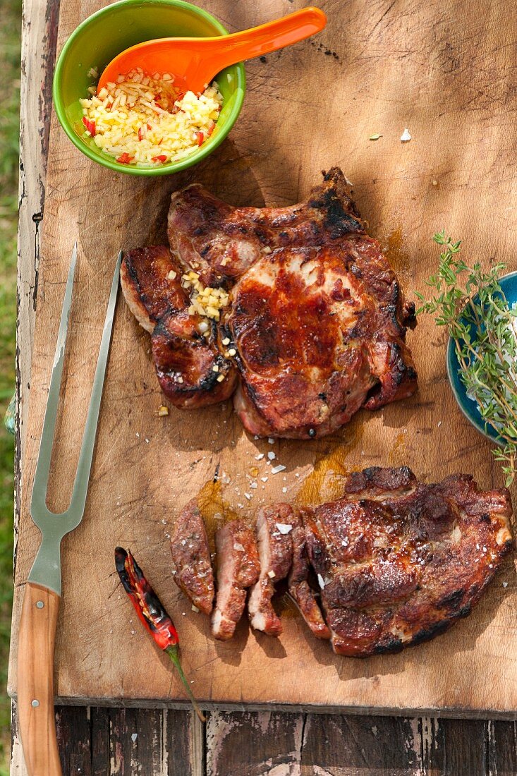 Grilled pork collar stakes with ginger and chilli