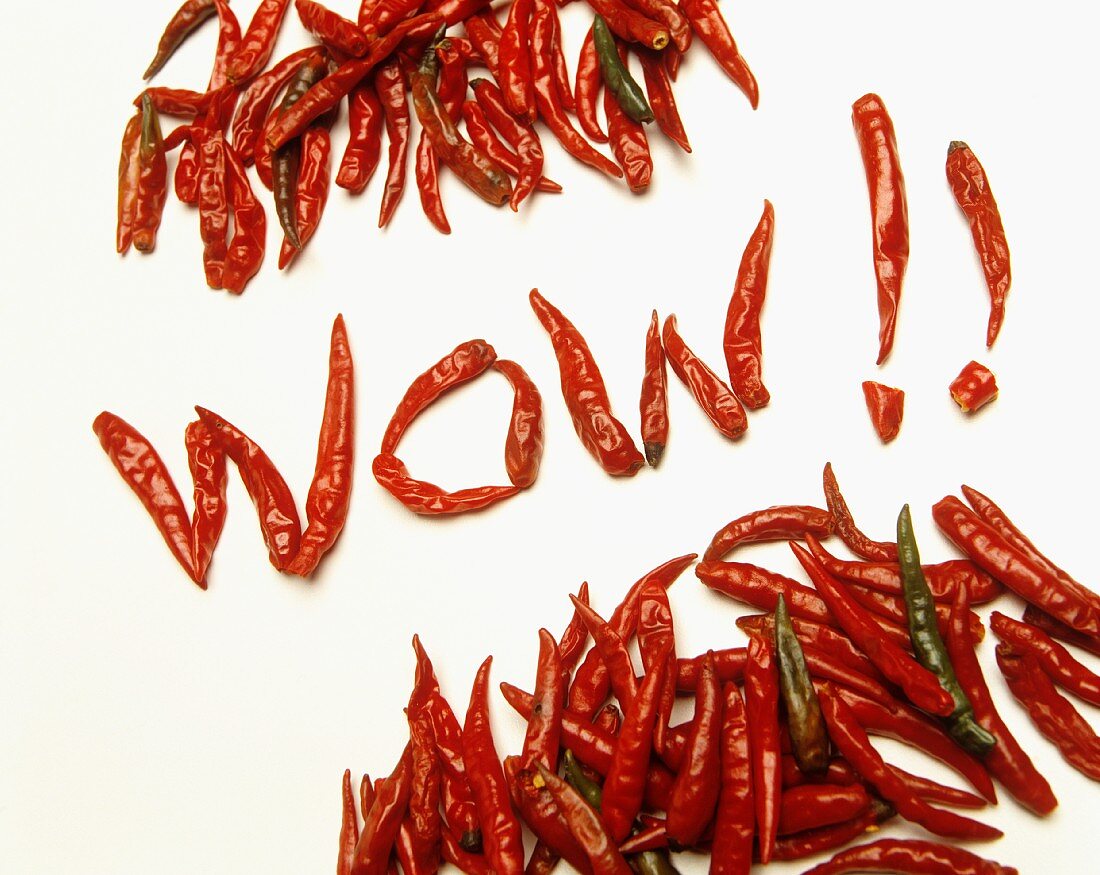 The word 'Wow!!' spelt using dried, red chilli peppers