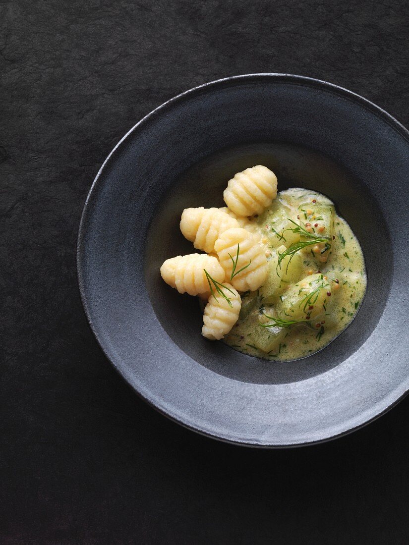 Potato gnocchi with braised dill cucumbers